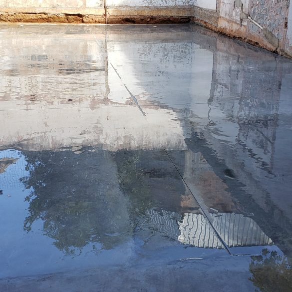 EXECUÇÃO DE PISO DE ALTA RESISTÊNCIA PARA UMA GRÁFICA